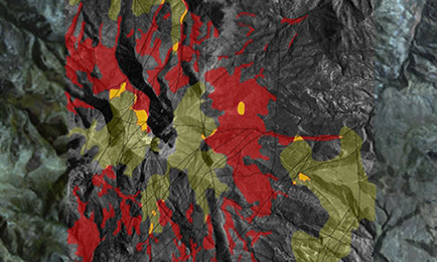 This mineral classification map shows areas containing high concentrations of copper (red) and feldspar (green). 