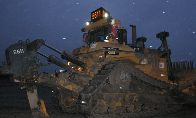 Ralph’s Radio Ltd. makes 26-inch three-sided signs for the top of graders and dozers.