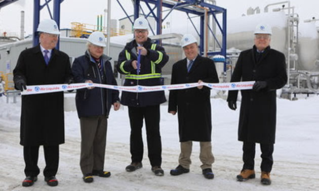 Officials with Air Liquide Canada celebrate the opening of a CO2 recovery plant. 