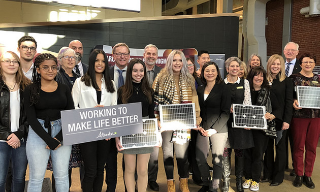 Minister Phillips, Minister Eggen, MLA Annie McKitrick and MLA Chris Nielsen join students and faculty from Archbishop O'Leary High School to announce a new solar program for schools.