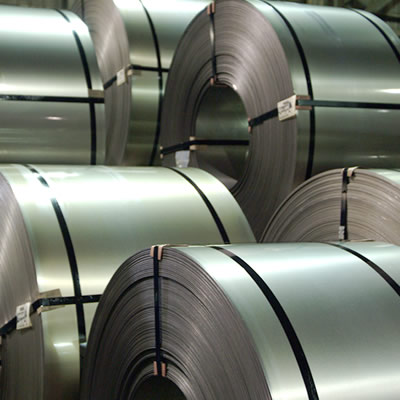 Large coils of rolled-up steel. 