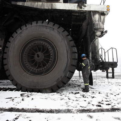 Giant tires on mining truck. 