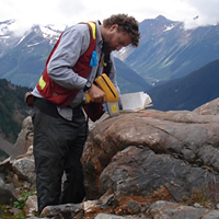 Geologist Chris Gallagher uses an XRF unit on Eagle Plains Resources’ Kalum property in northern B.C. 
