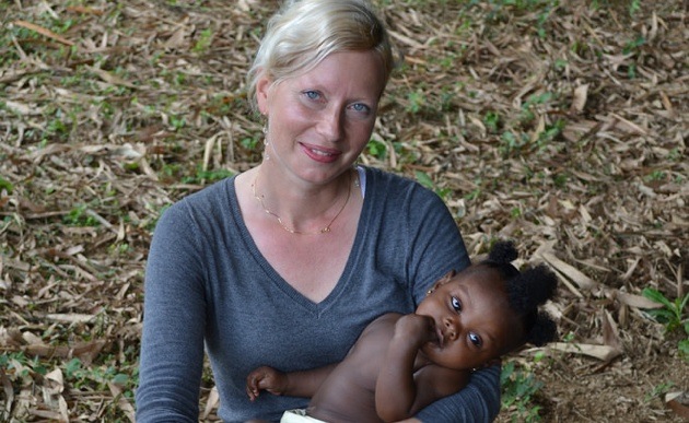 Danae is with a baby called Blessing, in Zoryea Town Liberia. 