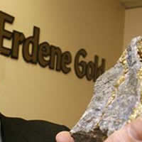 In this Chronicle Herald Photo CEO of Erdene Resources. Peter Akerley, displays a a vein of precious metal.