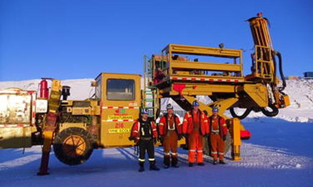 Glencore First Mobile equipment mechanics with their reconditioned Bolter. 