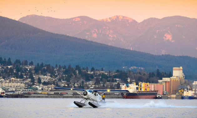 A seaplane taking off from the water. 