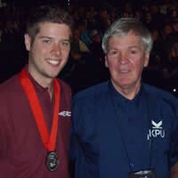 Photo of Nathaniel Printis, silver medalist with Ron McKeown, KPU Welding Instructor.