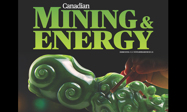Cover of Mining and Energy magazine, with picture of green jade. 