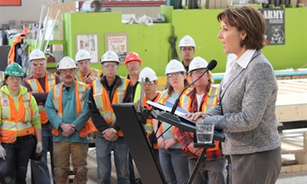 Photo of Premier Christy Clark meeting with about 250 employees of Britco in Penticton in September