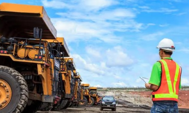 Line of mining trucks. 