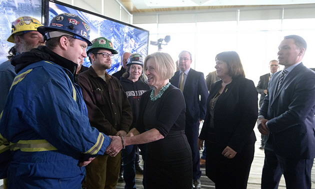 Premier Notley greets members of the Building Trades of Alberta while announcing a new Expression of Interest for refining in the province.