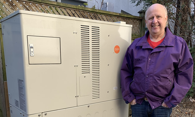 Craig Clydesdale, Founder and CEO of OOM Energy, with the unit which is a dedicated energy system called an Integrated Energy Platform™ (IEP).