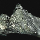 A chunk of jagged, silvery rock