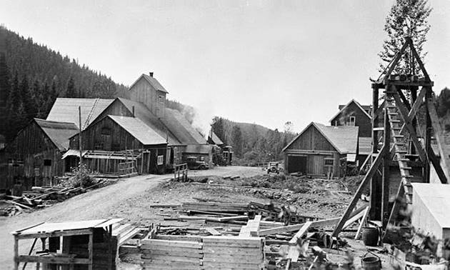 black and white photo of an old mining camp