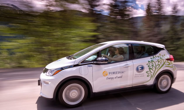Hon. Michelle Mungall driving the Kootenay Pass in a Chevrolet Bolt, on her way to celebrate the Accelerate Kootenays electric vehicle charging network.