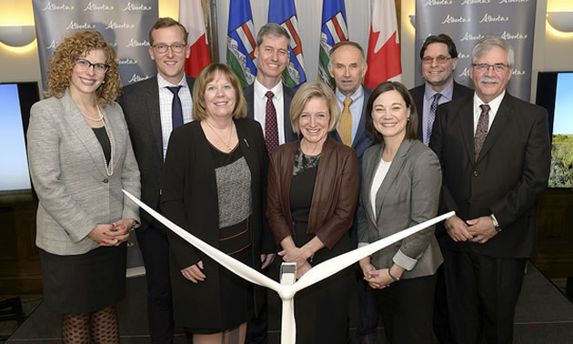 L-R: Megan Zimmerman (CED), Ryan Brown (EDP Renewables), Mike Law (Alberta Electric System Operator), Pascal Brun (Enel Green Power) Robert Hornung (CanWea), and Brian Vaasjo (Capital Power) with Minister McCuaig-Boyd, Premier Notley and Minister Phillips.