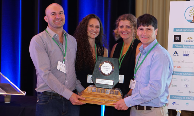 Chris Hercun, Sarah Whitehouse, Jaimie Dickson and Richard Doucette of Teck Highland Valley Copper Partnership receive the Jake McDonald Annual Mine Reclamation Award in Williams Lake on September 19. 