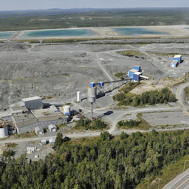 An aerial photo of the fully permitted Sigma Milling Facility and Tailings (looking North). 