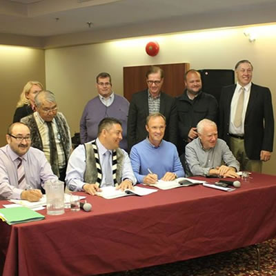 Members of the KIA and Agnico Eagle executive team sign the IIBA agreement in Rankin Inlet. Front row (left to right): Kono Tattuinee, Secretary Treasurer KIA, David Ningeongan, President KIA, Sean Boyd, Chief Executive Officer Agnico Eagle, Jim Nasso, Chair, Agnico Eagle