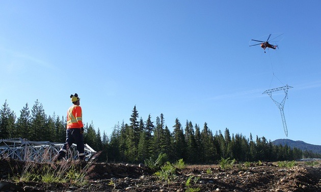 The NTL required extensive use of helicopters to erect towers on the line's rugged terrain.