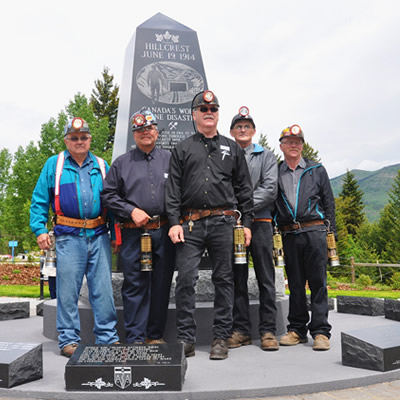 In 2014, John Kinnear (centre) stands in front of a memorial as part of a honour guard during the 100th anniversary of the Hillcrest Mine Disaster, when 189 men were lost.