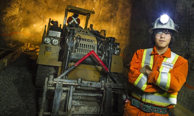 A student working at Minto Mine in the Yukon