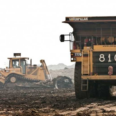 Picture of heavy equipment at mining site. 