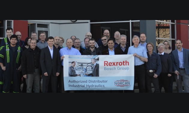 Staff at Norcan Fluid Power's Langley location join representatives from Bosch Rexroth to celebrate sole distribution deal for Western Canada. 