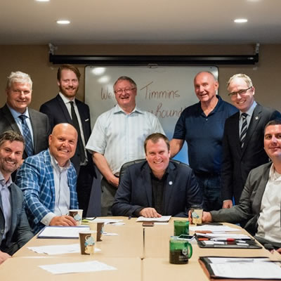 Chris Hodson, Cameron Grant, Bill MacRae, Tom Laughren, Kevin Edgson, Nick Stewart (first row), Derek Nighbor, Rocco Rossi, Mayor Steve Black and Paul-Emile McNab gathered in Timmins for a Resources Roundtable. 