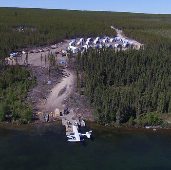 Aerial view of the Rook 1 camp with a sea plane at the doc on Patterson Lake.