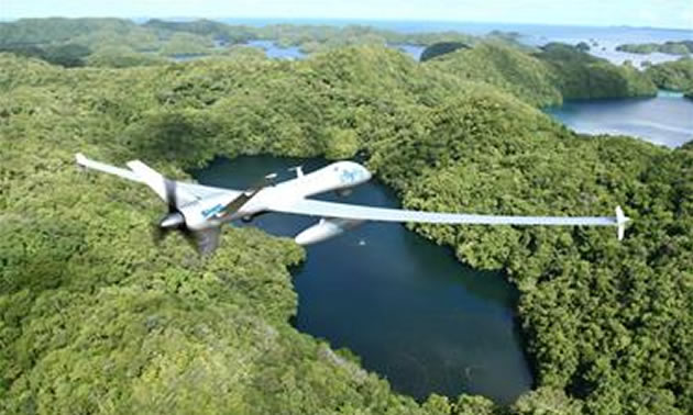 An unmanned aerial vehicle takes flight, powered by a Protonex fuel cell UAV propulsion system. 