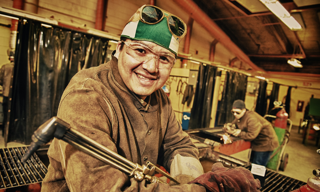 a smiling man working